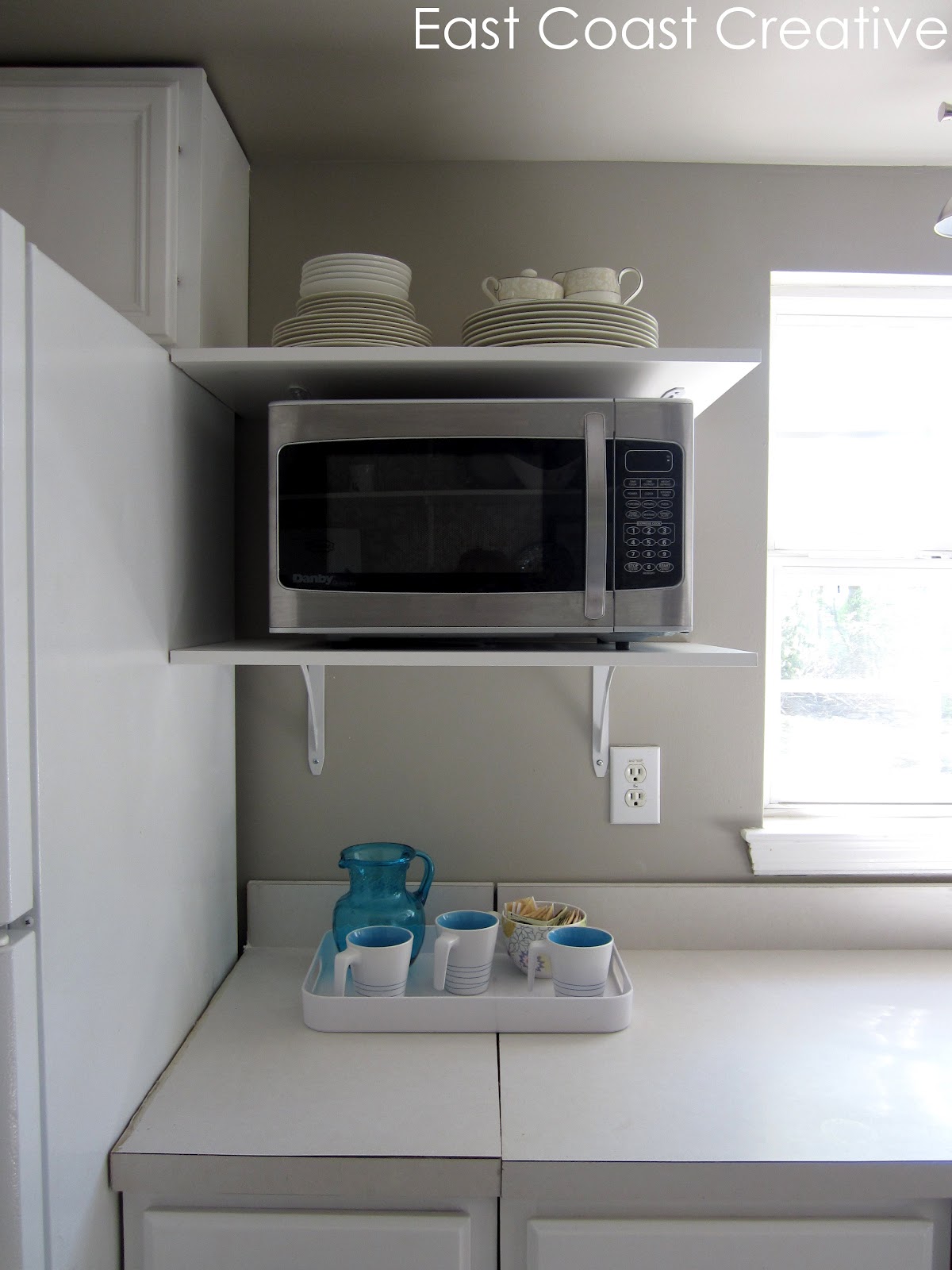 Куда поставить микроволновку на кухне: 9 вариантов и полезные советы